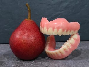 pear eating with denture